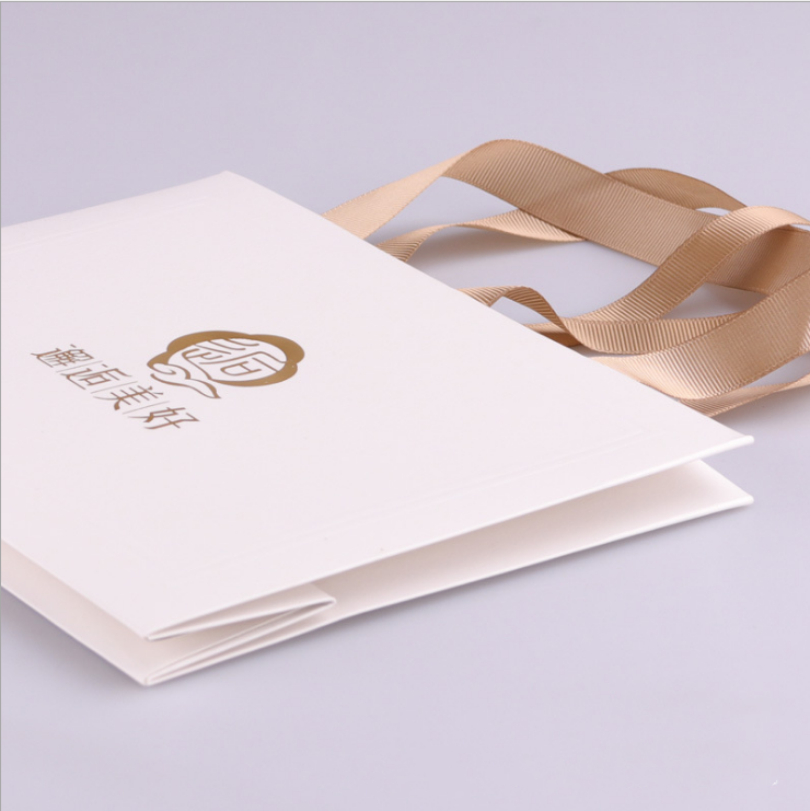 Custom Luxuria Ribbon Handle White Cardboard Shipping paper Packaging