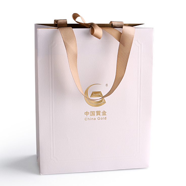 Custom Luxuria Ribbon Handle White Cardboard Shipping paper Packaging